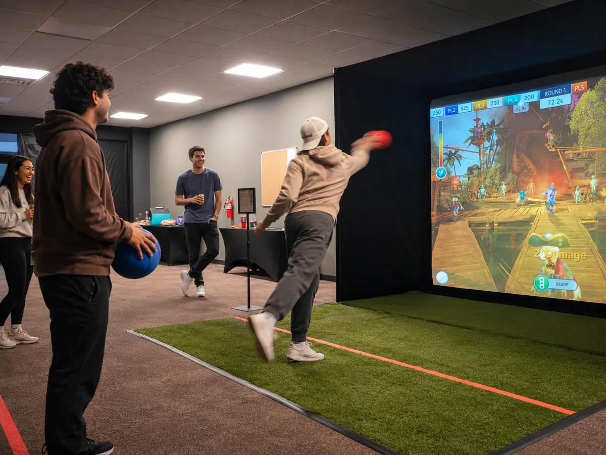 Group playing Zombie Dodgeball in the private Sim Time venue